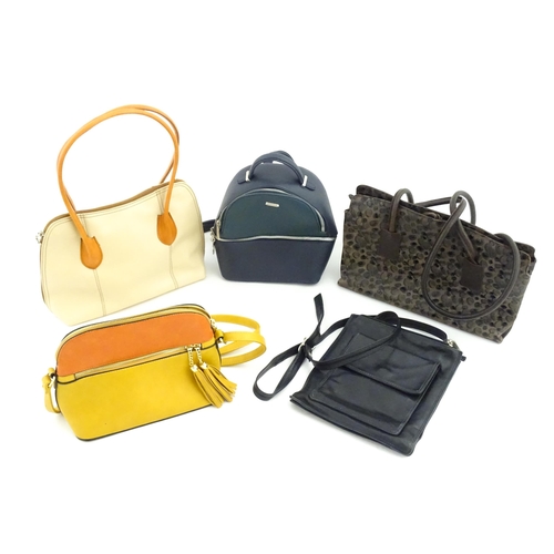 1268 - Vintage fashion: Five leather handbags to include a mustard and orange bag measuring 8 x 10