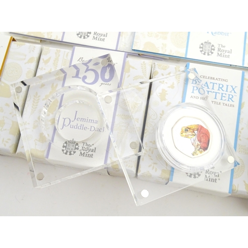 786A - Coins: A quantity of Royal Mint Beatrix Potter 50p / fifty pence commemorative collectable coins, co... 