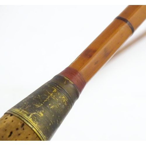 1218 - An early 20thC three-piece 10ft fly fishing rod by Hardy Bros , Alnwick , constructed from whole can... 