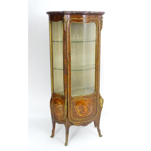 1389 - An early 20thC marbled topped kingwood cabinet with gilt metal mounts and brackets, the kingwood fra... 