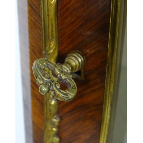 1389 - An early 20thC marbled topped kingwood cabinet with gilt metal mounts and brackets, the kingwood fra... 