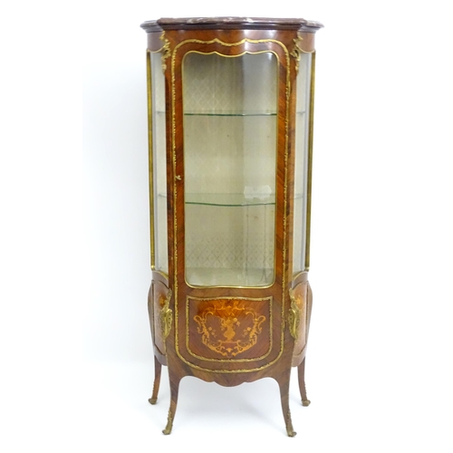 1389 - An early 20thC marbled topped kingwood cabinet with gilt metal mounts and brackets, the kingwood fra... 