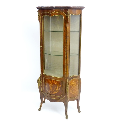 1389 - An early 20thC marbled topped kingwood cabinet with gilt metal mounts and brackets, the kingwood fra... 