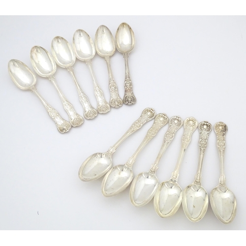 524 - Twelve associated Victorian silver Kings pattern dessert spoons comprising six hallmarked London 184... 