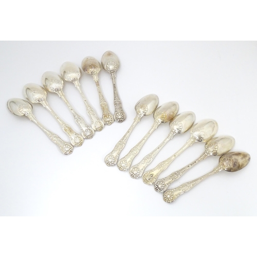 524 - Twelve associated Victorian silver Kings pattern dessert spoons comprising six hallmarked London 184... 