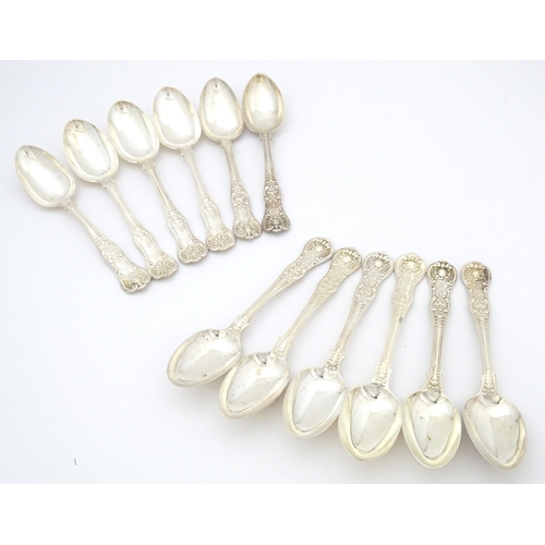 524 - Twelve associated Victorian silver Kings pattern dessert spoons comprising six hallmarked London 184... 