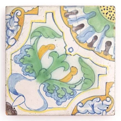 82 - Four terracotta tiles with floral and foliate motifs, by Frederick Garrard at the Millwall Pottery, ... 