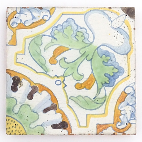 82 - Four terracotta tiles with floral and foliate motifs, by Frederick Garrard at the Millwall Pottery, ... 