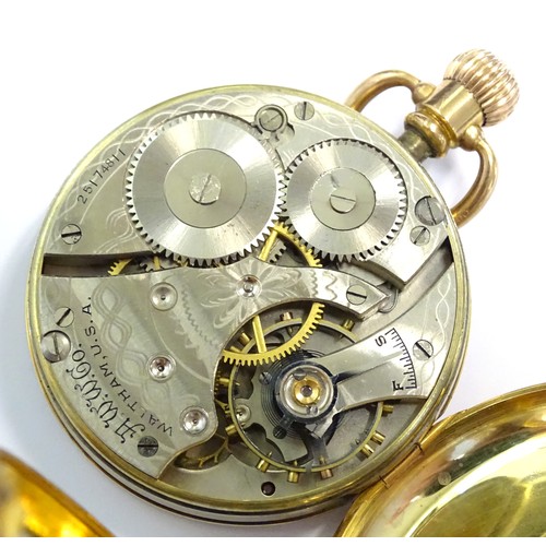 754 - A Waltham USA 9ct gold cased open face pocket watch, the white enamel dial with Arabic numerals and ... 