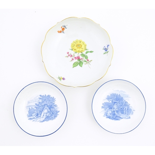 98 - A Continental dessert plate with hand painted flower detail, marked under with Meissen style crossed... 