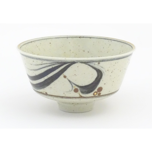 109A - A studio pottery footed bowl with brushwork detail by Derek Clarkson (1928-2013). Makers mark to foo... 