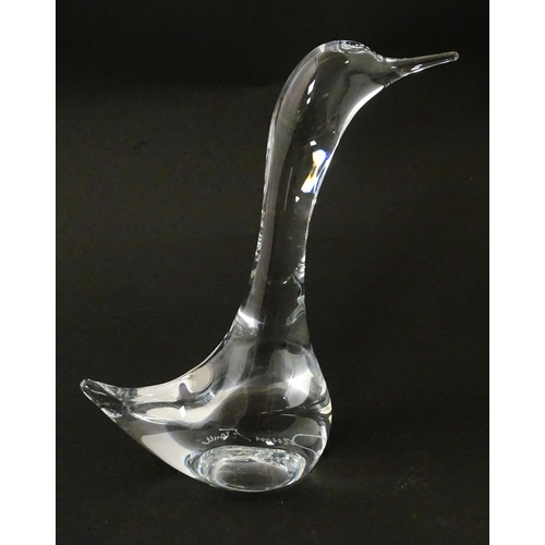 236 - A clear glass model of a goose, signed Daum France. Approx 7 1/2