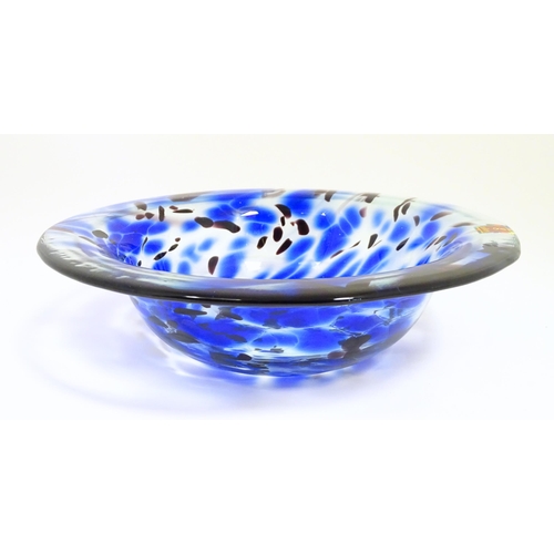 243 - An art glass centre piece bowl  with blue and clear detail. Approx 11 1/4