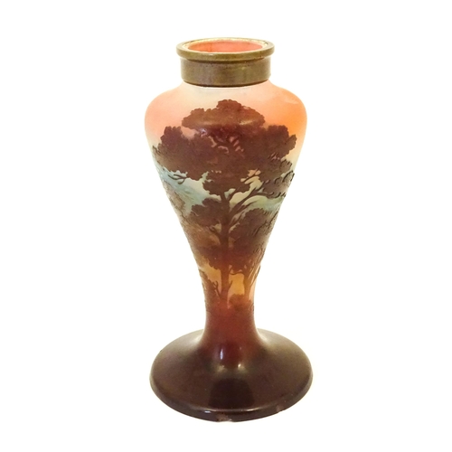 266 - A Galle glass vase with tree and landscape decoration. Approx 6 1/4