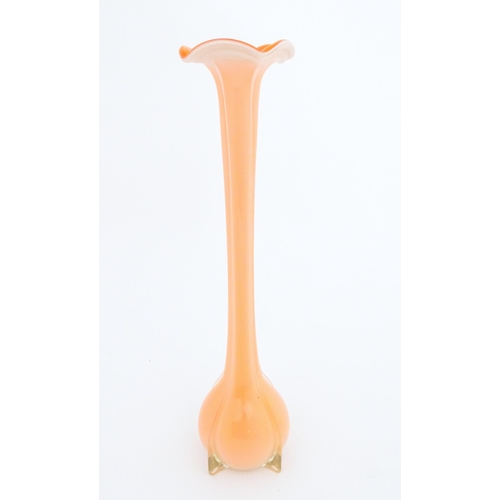 276 - A tall Empoli orange glass vase. Approx. 20