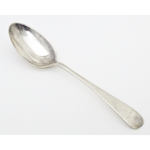 455 - An Egyptian silver pin dish together with a silver teaspoon hallmarked Sheffield 1930 and a white me... 