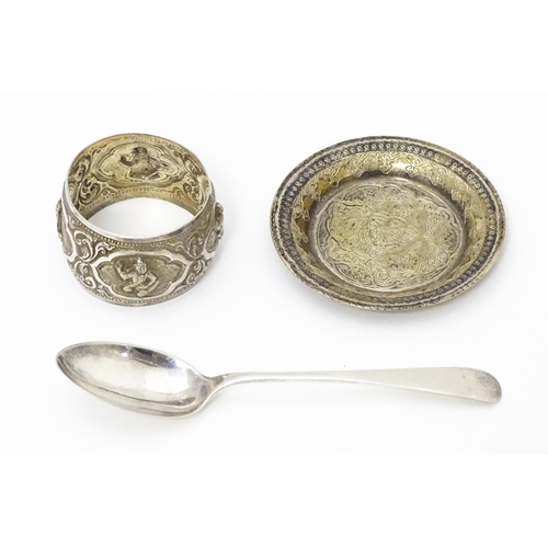 455 - An Egyptian silver pin dish together with a silver teaspoon hallmarked Sheffield 1930 and a white me... 