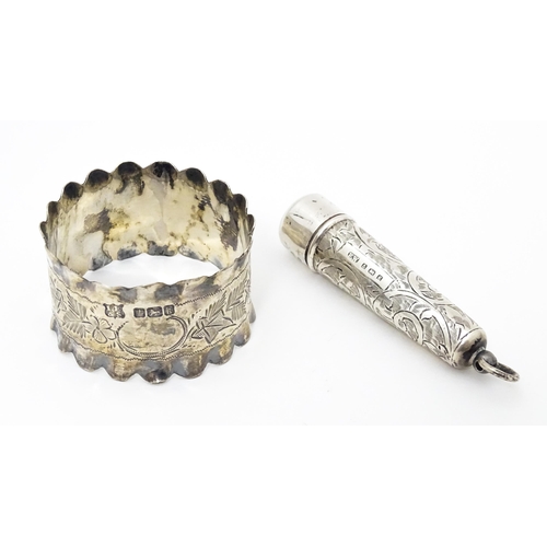 463 - A silver napkin ring with engraved floral and foliate decoration hallmarked Sheffield 1902, maker Is... 