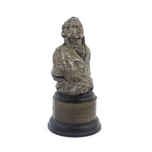 1040 - An early 20thC commemorative model of the figurehead of HMS Hastings, on a turned wooden base with t... 