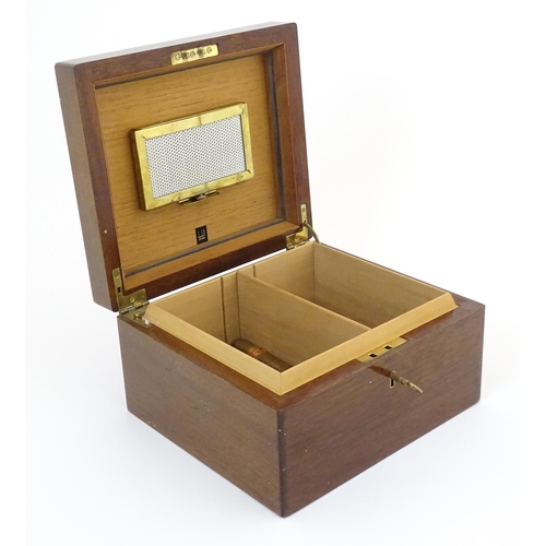 1178 - A 20thC mahogany Dunhill cedar lined humidor with two sections within. Together with a quantity of c... 