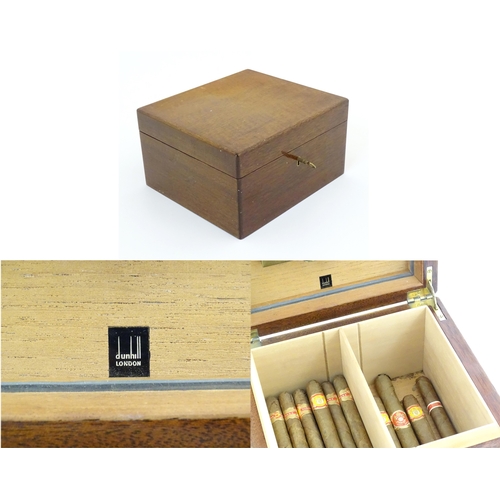 1178 - A 20thC mahogany Dunhill cedar lined humidor with two sections within. Together with a quantity of c... 