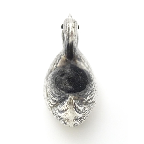 305 - A silver pin cushion formed as a duck. Approx. 2