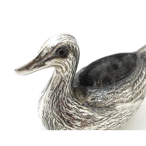 305 - A silver pin cushion formed as a duck. Approx. 2