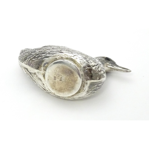 305 - A silver pin cushion formed as a duck. Approx. 2