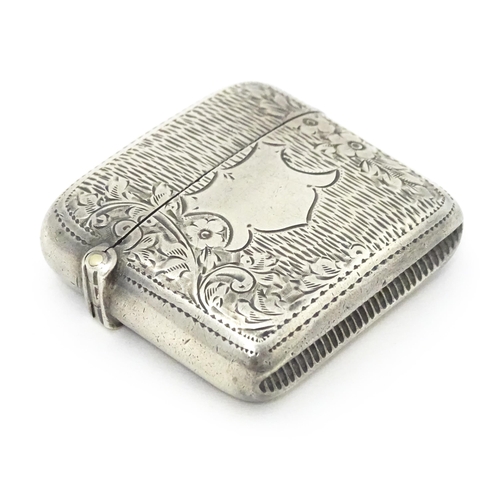 309 - A silver vesta case with engraved decoration hallmarked Birmingham 1903, maker William Henry Sparrow... 