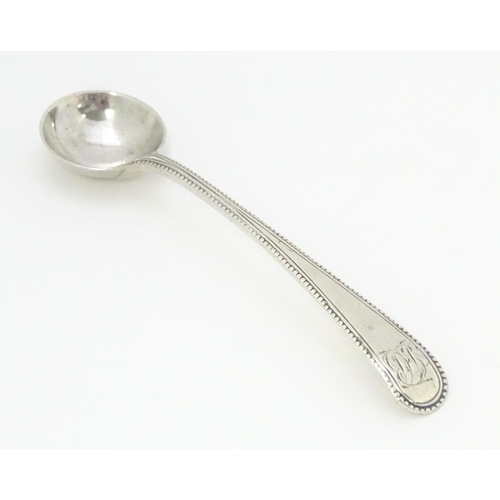 313 - A silver Old English pattern bead edge salt spoon hallmarked London 1783. Approx. 4