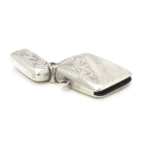 323 - A silver vesta case with engraved decoration hallmarked Birmingham 1916, maker Jones & Crompton. App... 