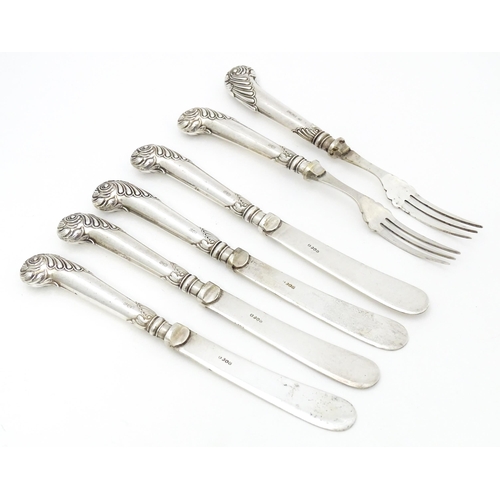 324 - Four butter / tea knives with silver pistol grip handles. Together with two forks. Hallmarked Sheffi... 