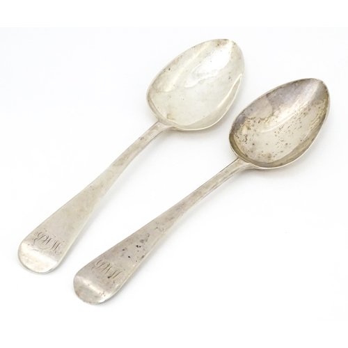 327 - A pair of Geo III silver table spoons hallmarked London 1818, maker TW. Approx. 8 3/4