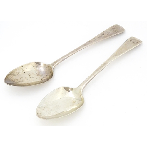 327 - A pair of Geo III silver table spoons hallmarked London 1818, maker TW. Approx. 8 3/4