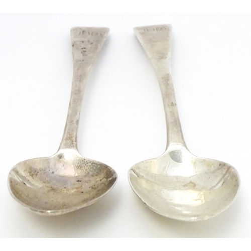 327 - A pair of Geo III silver table spoons hallmarked London 1818, maker TW. Approx. 8 3/4