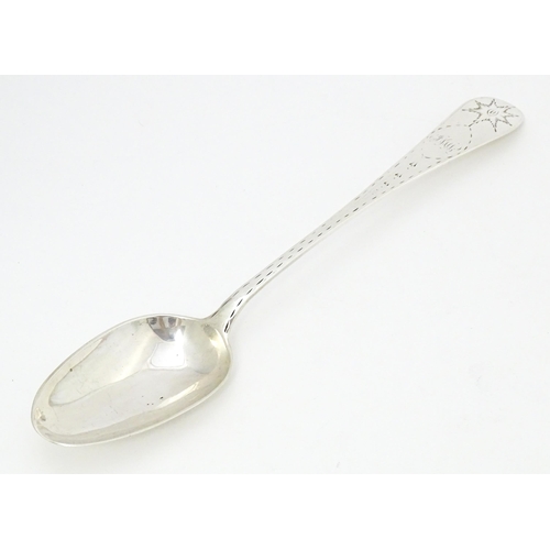 330 - An early 19thC provincial Irish silver table spoon with bright cut decoration, maker Carden Terry & ... 