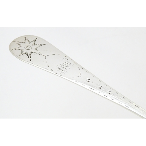 330 - An early 19thC provincial Irish silver table spoon with bright cut decoration, maker Carden Terry & ... 