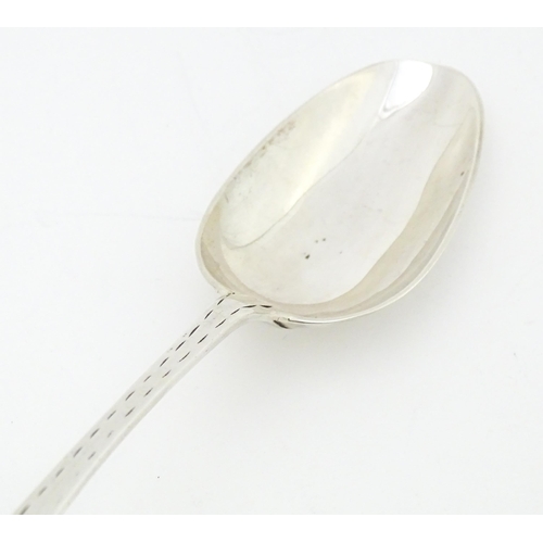 330 - An early 19thC provincial Irish silver table spoon with bright cut decoration, maker Carden Terry & ... 