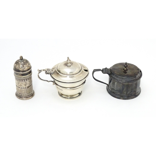 335 - A silver mustard pot hallmarked Birmingham 1926, maker Mappin & Webb Ltd. Together with another hall... 