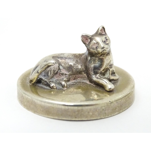 337 - Two Continental silver pill boxes, one surmounted by a model of a cat, bearing silver marks for Iraq... 