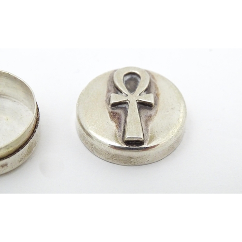 337 - Two Continental silver pill boxes, one surmounted by a model of a cat, bearing silver marks for Iraq... 