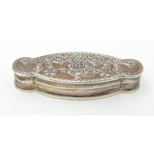 338 - A silver pill box of shaped form. Approx. 2 1/4