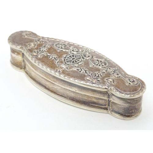 338 - A silver pill box of shaped form. Approx. 2 1/4