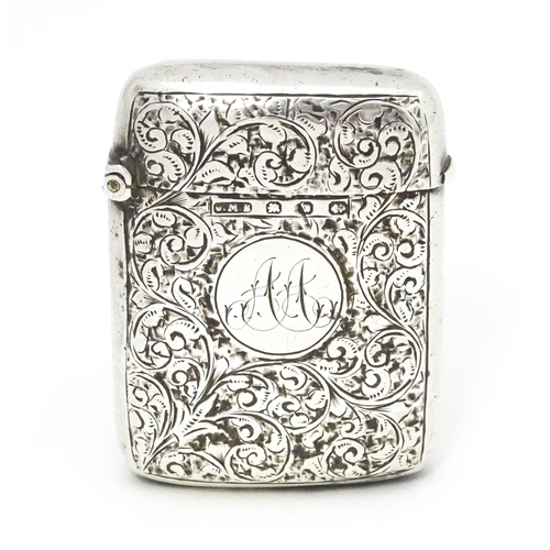 342 - A Victorian silver vesta case with engraved acanthus scroll decoration hallmarked Birmingham 1896, m... 