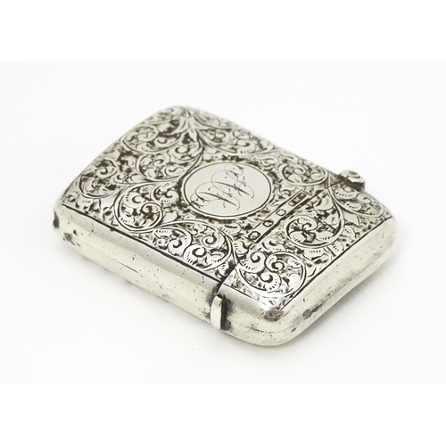 342 - A Victorian silver vesta case with engraved acanthus scroll decoration hallmarked Birmingham 1896, m... 