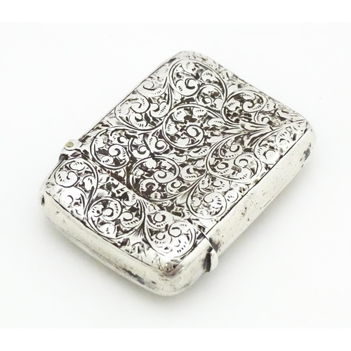 342 - A Victorian silver vesta case with engraved acanthus scroll decoration hallmarked Birmingham 1896, m... 