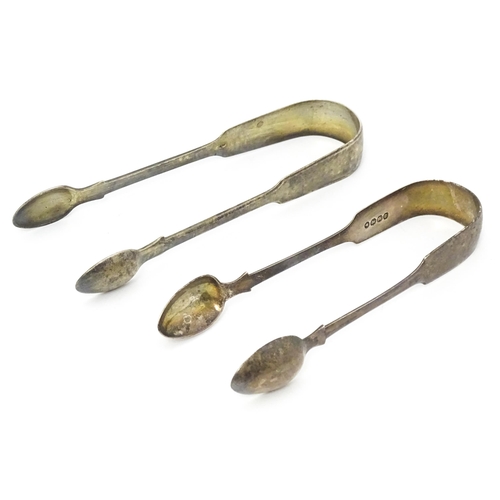 345 - Two Victorian Fiddle pattern sugar tongs one hallmarked Exeter 1863, maker Philip Osment, the other ... 