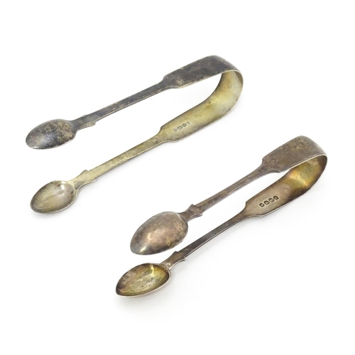 345 - Two Victorian Fiddle pattern sugar tongs one hallmarked Exeter 1863, maker Philip Osment, the other ... 