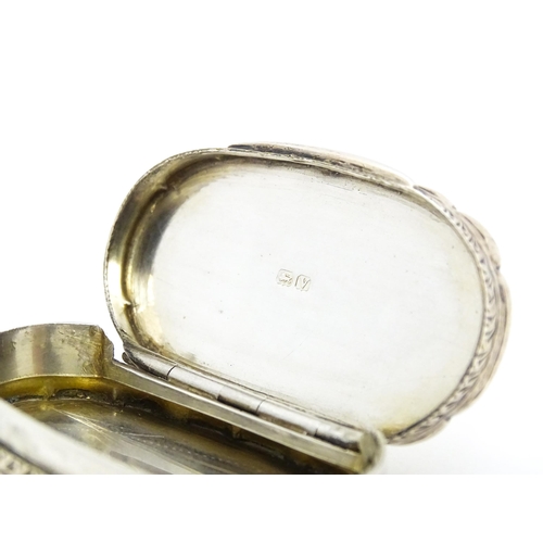 353 - A silver pill box with engraved decoration hallmarked Birmingham 1920, maker George Randle. Approx. ... 