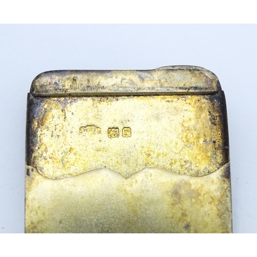 362 - A silver shooting butt marker case of slim form, opening to reveal a gilded interior with two five s... 